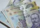 Apreciere nesemnificativă a leului față de euro, la BNR